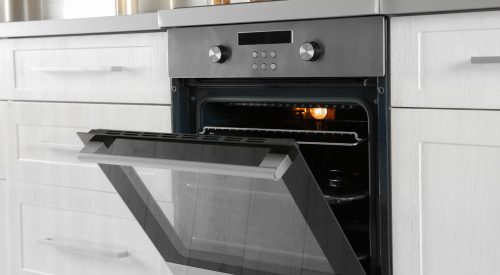 Open modern oven built in kitchen furniture