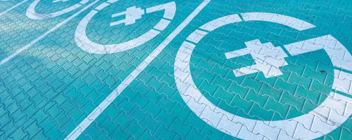 Electric vehicle and home charging station road sign. Green and clean energy for electric vehicles for healthy environment. Eco power from renewable source concept
